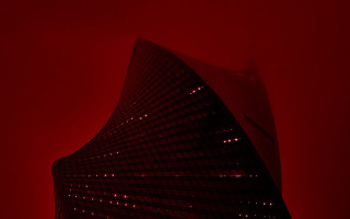 Tall building red light foggy - brutalism free wallpaper
