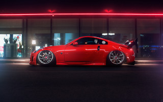 Red sports car night building - its light free wallpaper