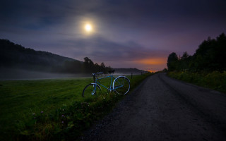Bike moonlit foggy night outdoor - the side of a road free wallpaper