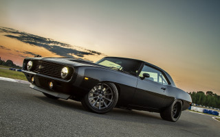 Black muscle car sunset clouds - dee whitcomb free wallpaper