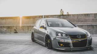 Grey car concrete road fence - a grey car free wallpaper