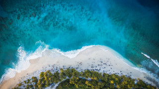 Aerial beach ocean sand shore - a blue ocean free wallpaper