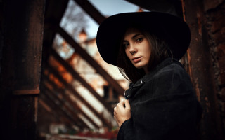 Woman black hat coat doorway - a doorway free wallpaper