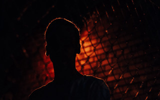 Man fence night cellphone starry - in the dark free wallpaper