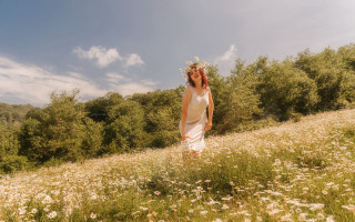 Flower field woman frisbee sky - a woman in a field of flowers free wallpaper
