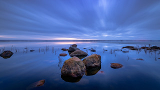 Lake rocks cloudy sky beach - auseklis ozol free wallpaper