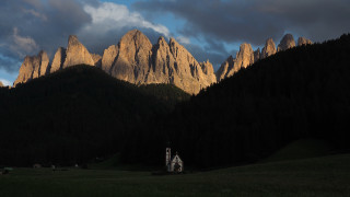 Church field mountains sunset clouds - dramatic light free wallpaper