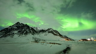 Green white aurora mountain scene - aurora free wallpaper