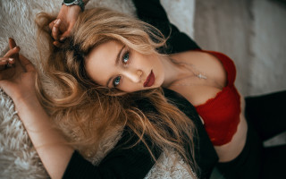 Woman blonde portrait laying redtop - a white rug free wallpaper