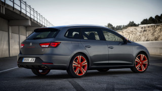 Grey car red rims parking - a metal free wallpaper