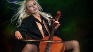 Woman black dress violin green - a green background behind her free wallpaper