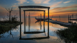 Boats dock sunset water mountains - a couple of boats free wallpaper