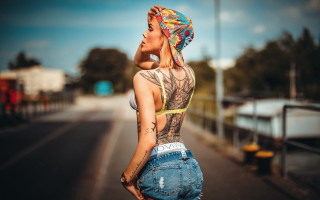 Woman tattoos yellow top street - a yellow top free wallpaper