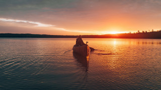 Canoe paddling lake sunset forest - dawn free wallpaper