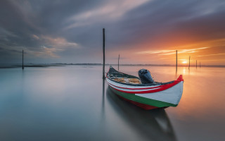 Boat sunset water dawn cloudy - the distance behind free wallpaper