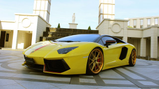 Yellow sports car clock tower - a clock tower in the background free wallpaper