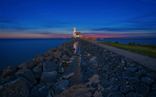 Lighthouse rocky shore dusk reflection - a rocky shore free wallpaper