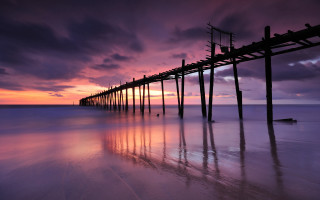 Pier beach purple sunset clouds - a long pier free wallpaper