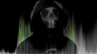 Hooded man green light night - footage free wallpaper