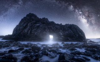 Rock formation hole stars night - a hole in the middle of it free wallpaper