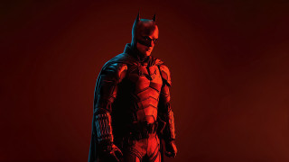 Batman armor glowing eyes red - a man in a batman costume free wallpaper