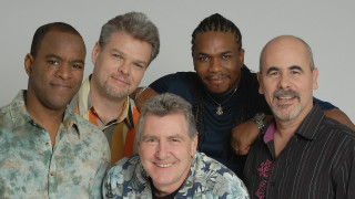 Group men posing smiling together - one man free wallpaper