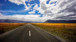 Long road fence mountains cloudy - empty free wallpaper for desktop