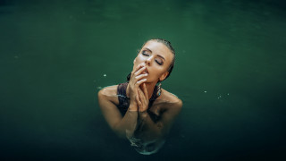Woman floating water hands face - artur tarnowski free wallpaper