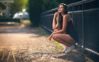 Woman fence road cigarette outdoors - a road free wallpaper