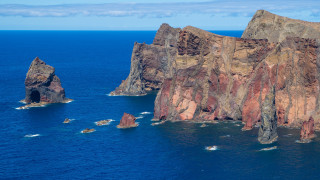Boats rocky island fantasy deep - a group of boats free wallpaper