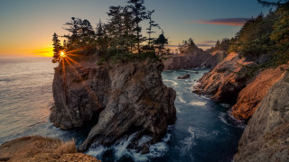 Sunset water trees rocks sky - rim light free wallpaper