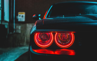 Car red taillight parked parkinglot - a parking lot next free wallpaper for desktop