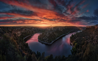 Sunset river forest red sky - a red sky in the background free wallpaper
