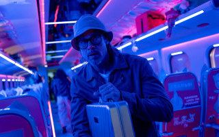 Man suitcase train night retrofuturism - the camera man free wallpaper