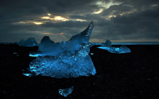 Iceberg black beach cloudy sky - cloud above free wallpaper