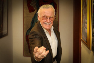 Man suit glasses pointing smiling - marvel comic free wallpaper