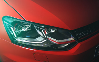 Red car headlight black background - beta vukanović free wallpaper