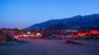Desert rocks lights mountains night - a desert free wallpaper for desktop