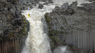 Man waterfall raft nature scene - the water below free wallpaper