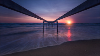 Sunset pier beach ocean waves - a pier free wallpaper