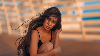 Woman beach blackbikini blowinghair portrait - a black bikini free wallpaper