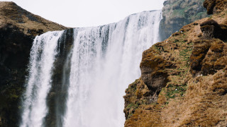 Waterfall man cliff bird nature - a bird free wallpaper
