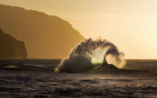Crashing wave mountain sunset beach - dawn free wallpaper