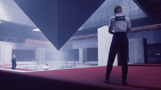 Futuristic man redcarpet blackandsuit woman - a red carpet free wallpaper