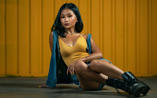 Woman sitting blue jacket yellow - daphne allen free wallpaper