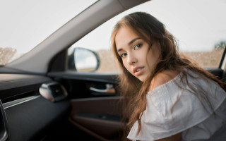 Serious woman car window brown - free vintage wallpaper for desktop