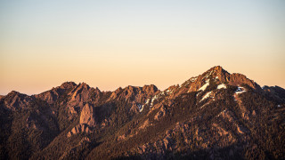 Mountain range snow capped sunset 2 - a clear sky free wallpaper