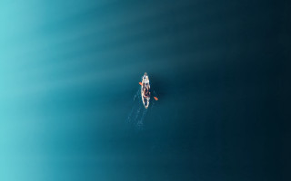 Ocean paddleboat minimalism tranquil microscopic - floating free wallpaper