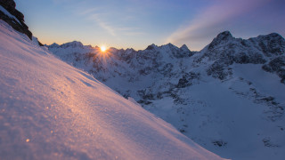 Snowboarder sunset mountains lake cityscape - auseklis ozol free wallpaper