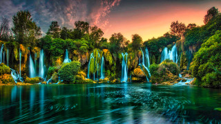 Waterfall river forest sunset impressionist - a colorful sky free wallpaper